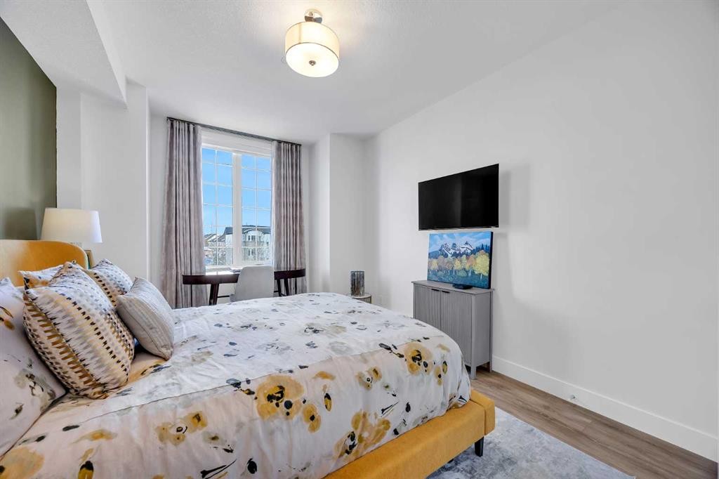 210-38 Quarry Gate Se, Calgary, AB - Indoor Photo Showing Bedroom