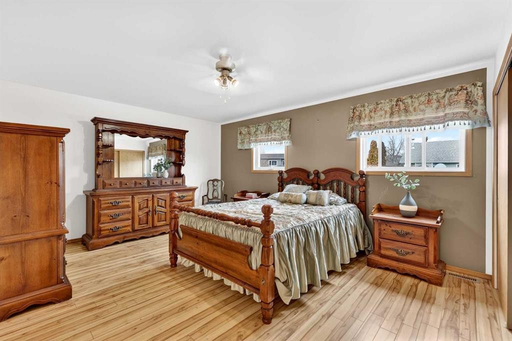 886 Erin Woods Drive Se, Calgary, AB - Indoor Photo Showing Bedroom
