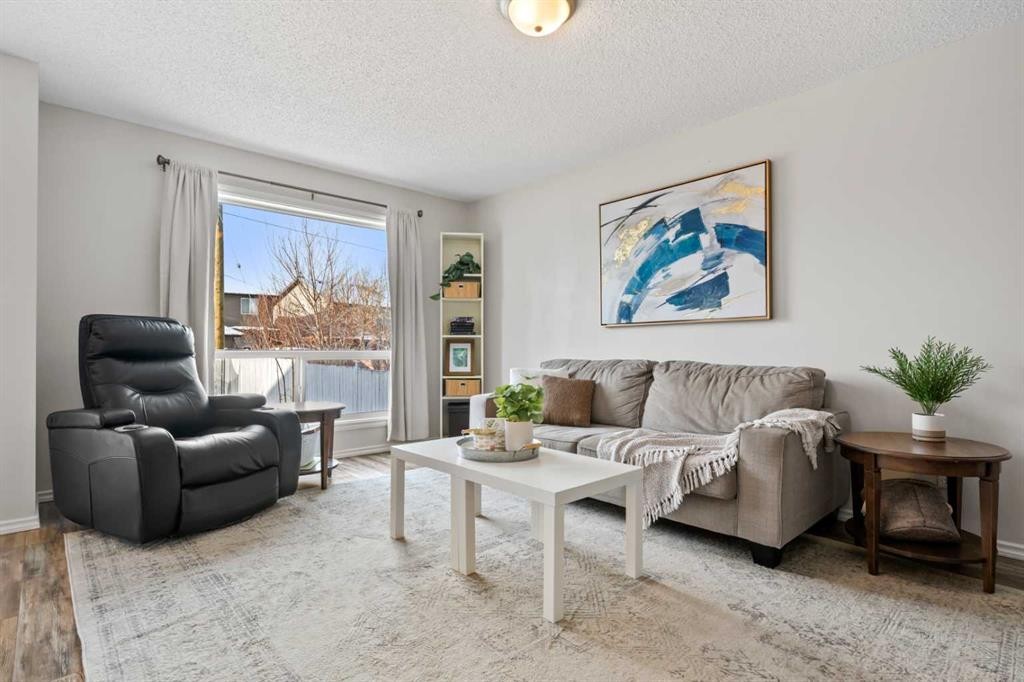 8 Chapalina Crescent Se, Calgary, AB - Indoor Photo Showing Living Room