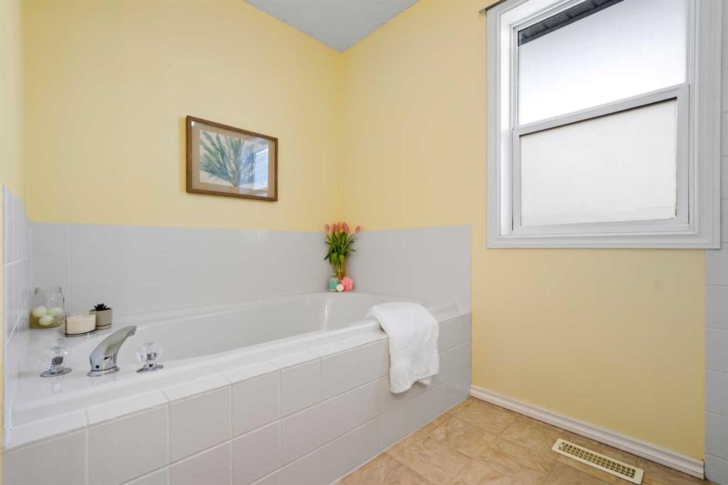8 Chapalina Crescent Se, Calgary, AB - Indoor Photo Showing Bathroom