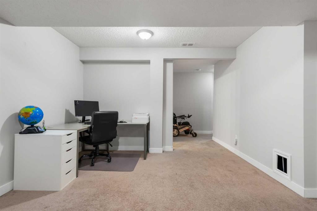 8 Chapalina Crescent Se, Calgary, AB - Indoor Photo Showing Office