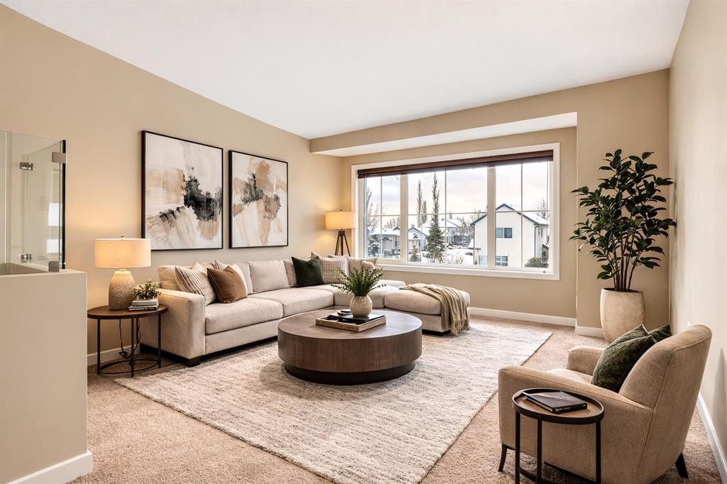 1205-230 Eversyde Boulevard Sw, Calgary, AB - Indoor Photo Showing Living Room