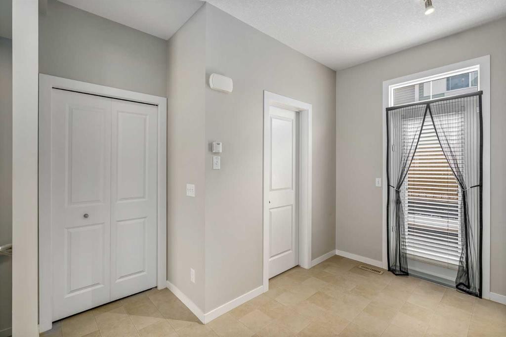 37 New Brighton Point Se, Calgary, AB - Indoor Photo Showing Other Room