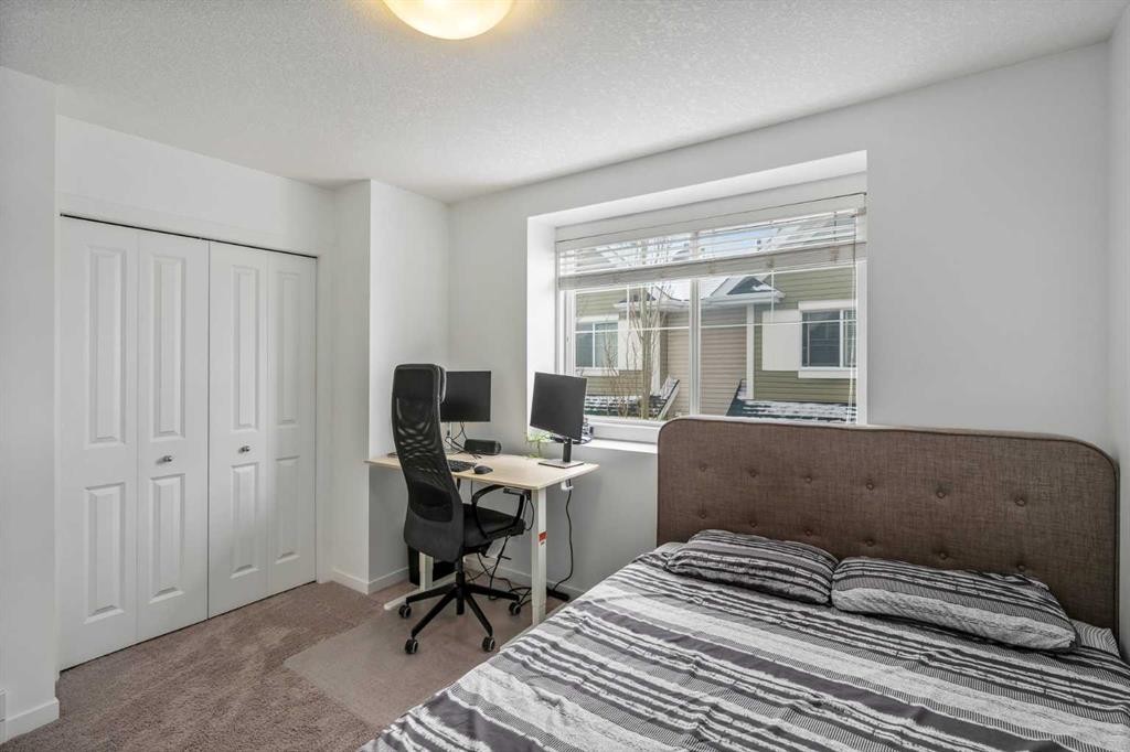 37 New Brighton Point Se, Calgary, AB - Indoor Photo Showing Bedroom
