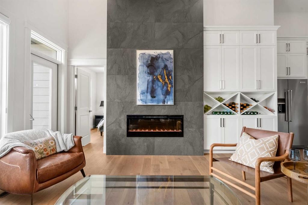 218 Mitchell Heath Nw, Calgary, AB - Indoor Photo Showing Living Room With Fireplace
