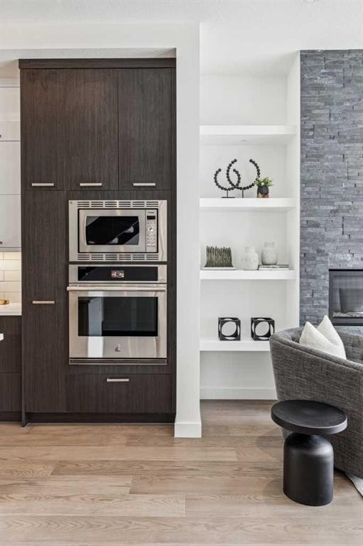 1765 7 Avenue Nw, Calgary, AB - Indoor With Fireplace