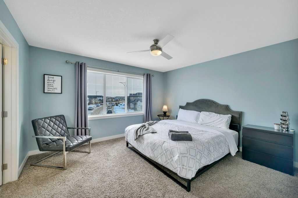 57 Hampton Crescent, Sylvan Lake, AB - Indoor Photo Showing Bedroom