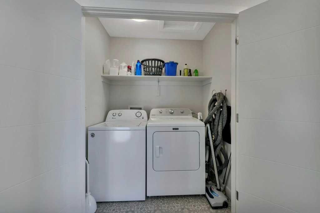 57 Hampton Crescent, Sylvan Lake, AB - Indoor Photo Showing Laundry Room