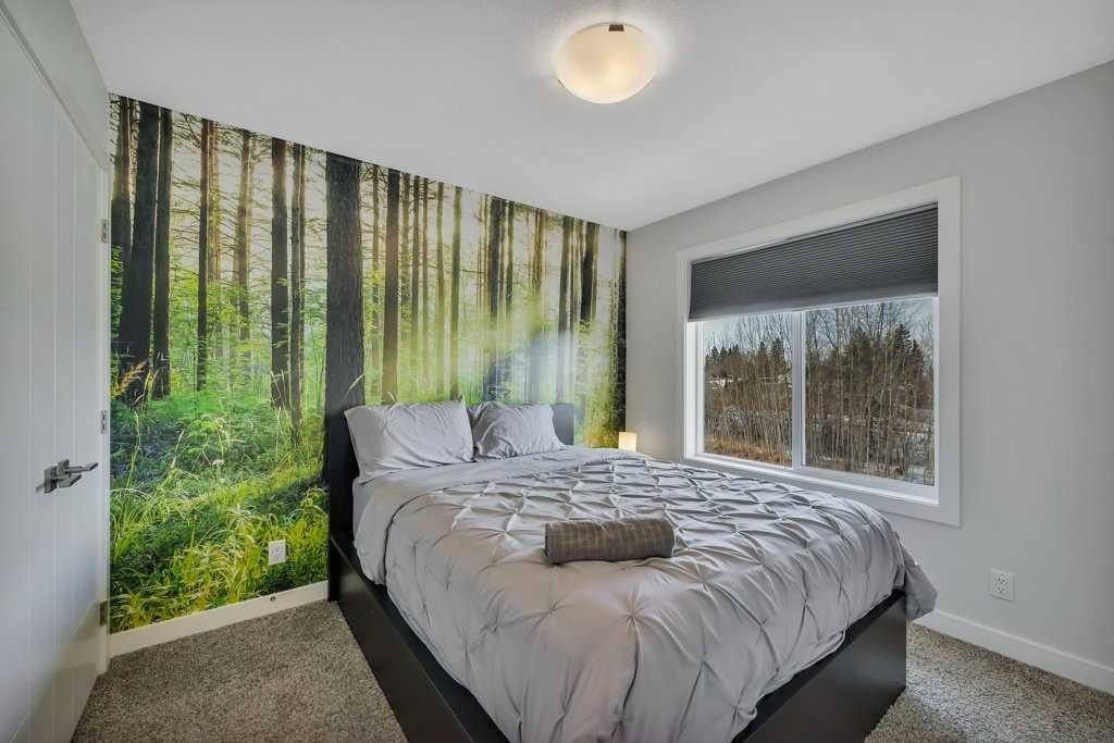 57 Hampton Crescent, Sylvan Lake, AB - Indoor Photo Showing Bedroom