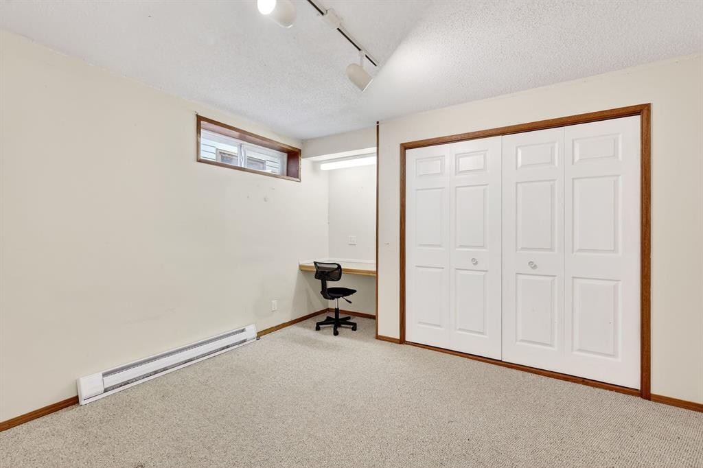 29 Sundown Way Se, Calgary, AB - Indoor Photo Showing Other Room