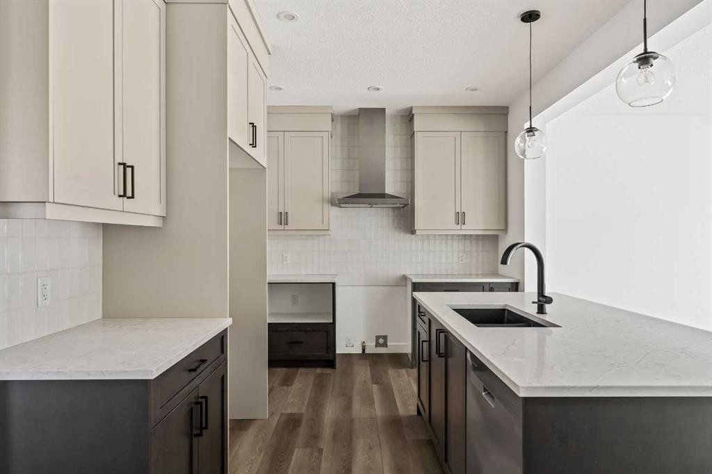 49 Starling Passage Nw, Calgary, AB - Indoor Photo Showing Kitchen With Upgraded Kitchen