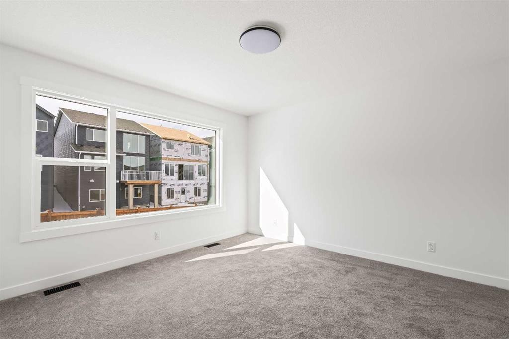 49 Starling Passage Nw, Calgary, AB - Indoor Photo Showing Other Room