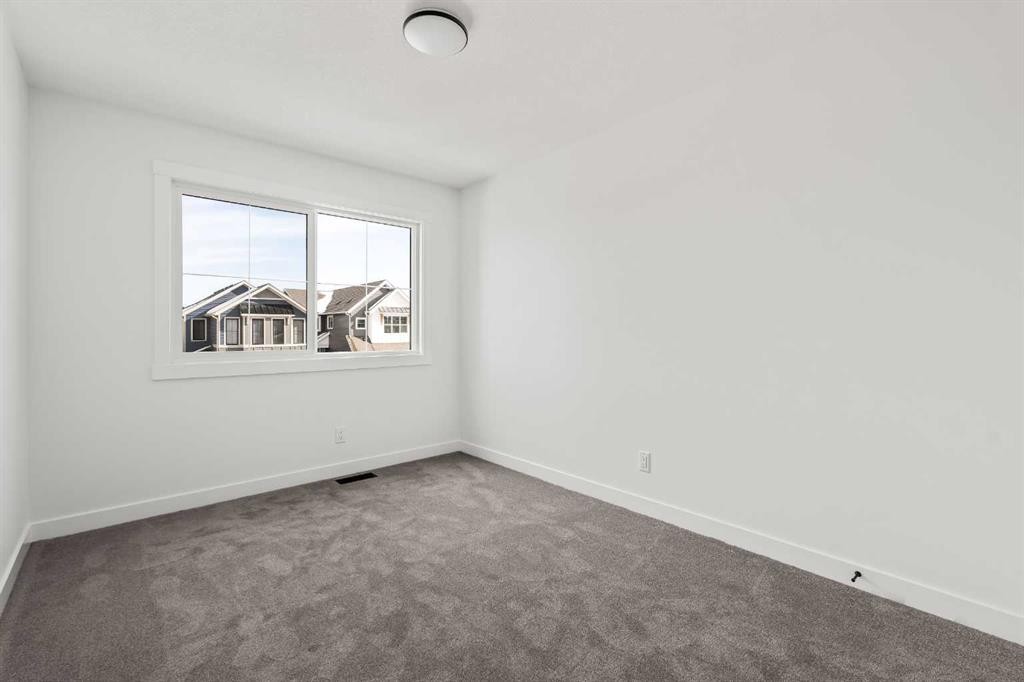 49 Starling Passage Nw, Calgary, AB - Indoor Photo Showing Other Room