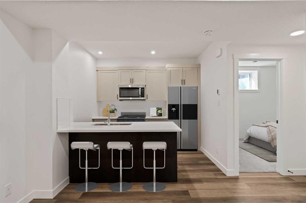 49 Starling Passage Nw, Calgary, AB - Indoor Photo Showing Kitchen