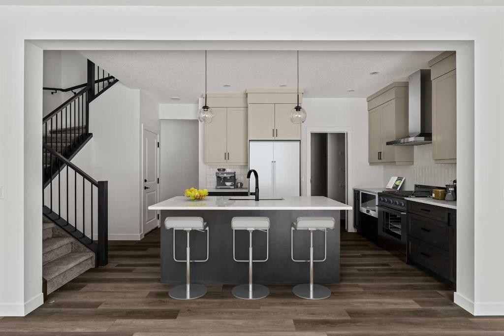 49 Starling Passage Nw, Calgary, AB - Indoor Photo Showing Kitchen With Upgraded Kitchen