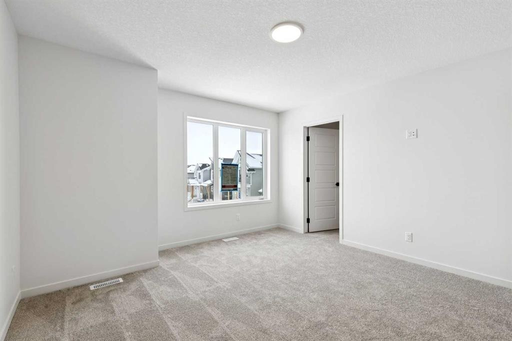 175 Herron Landing Ne, Calgary, AB - Indoor Photo Showing Other Room