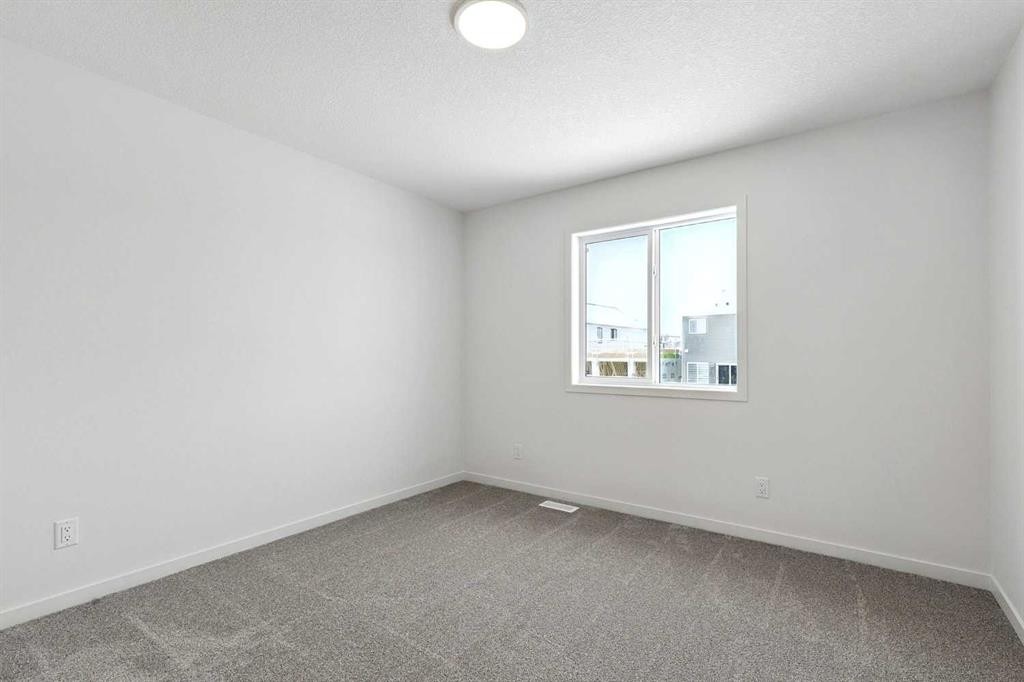 175 Herron Landing Ne, Calgary, AB - Indoor Photo Showing Other Room