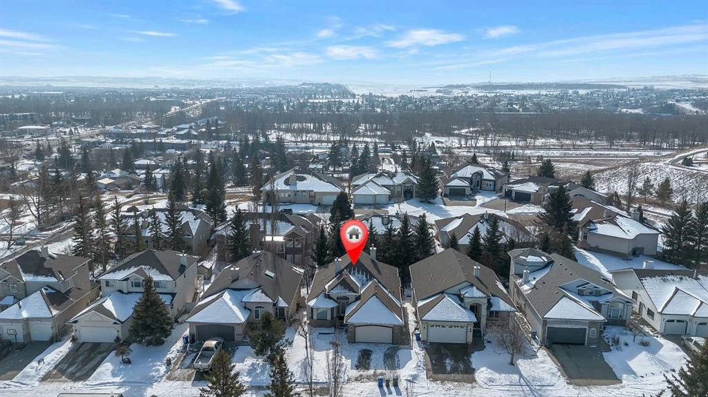 52 Sandstone Ridge Crescent, Okotoks, AB - Outdoor With Facade