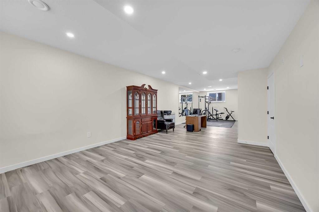 76 Edith Mews Nw, Calgary, AB - Indoor Photo Showing Other Room