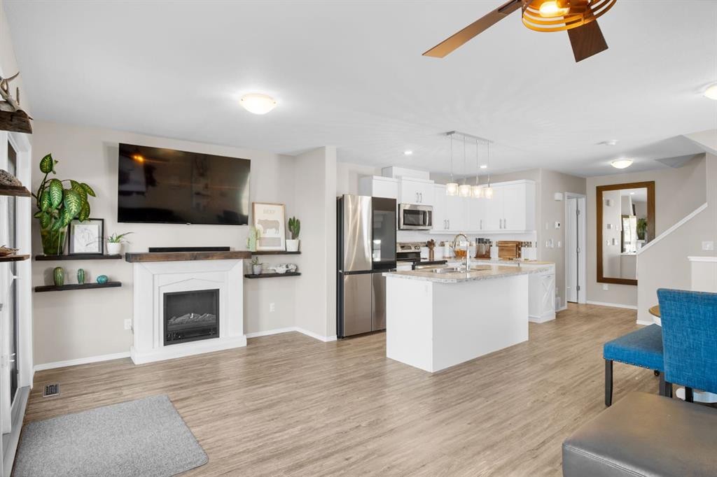 2314 19 Avenue, Bowden, AB - Indoor With Fireplace