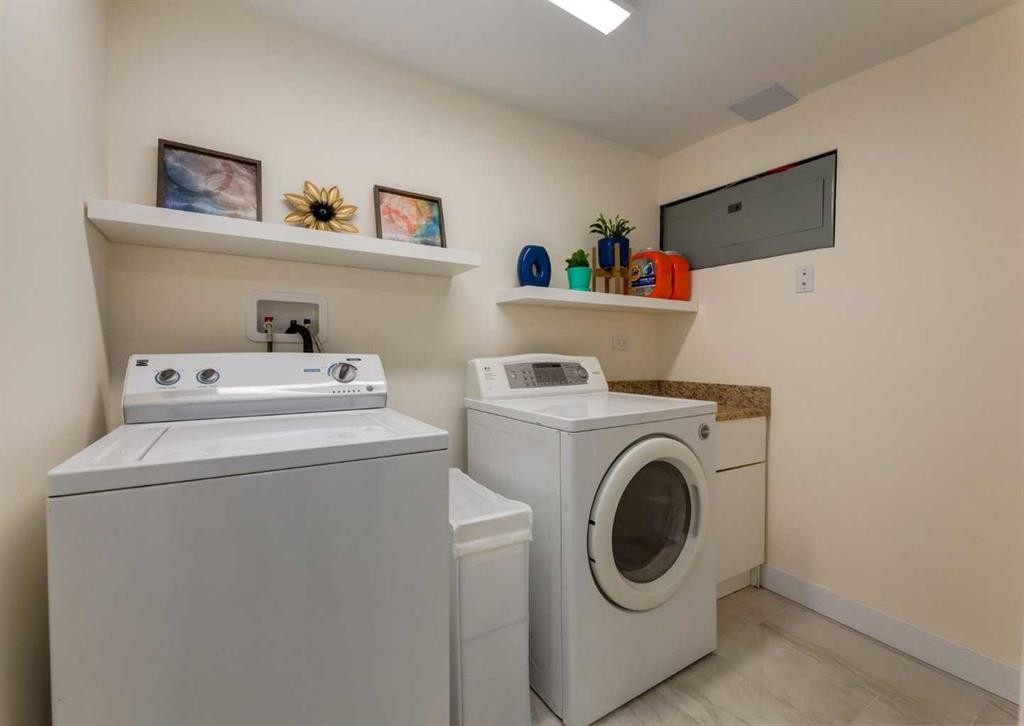 5219 Valiant Drive Nw, Calgary, AB - Indoor Photo Showing Laundry Room