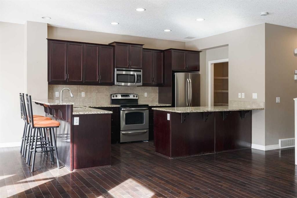 115 Auburn Glen Way Se, Calgary, AB - Indoor Photo Showing Kitchen With Stainless Steel Kitchen With Upgraded Kitchen