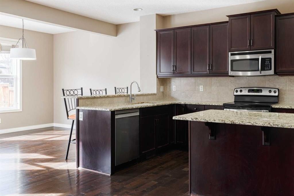 115 Auburn Glen Way Se, Calgary, AB - Indoor Photo Showing Kitchen With Upgraded Kitchen
