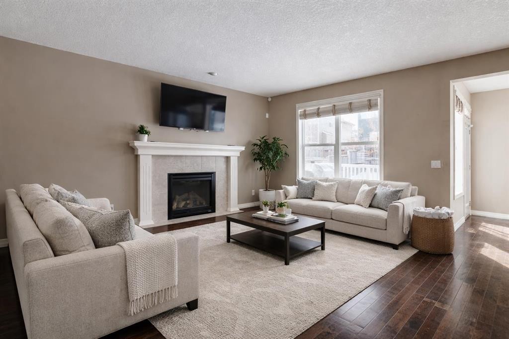 115 Auburn Glen Way Se, Calgary, AB - Indoor Photo Showing Living Room With Fireplace