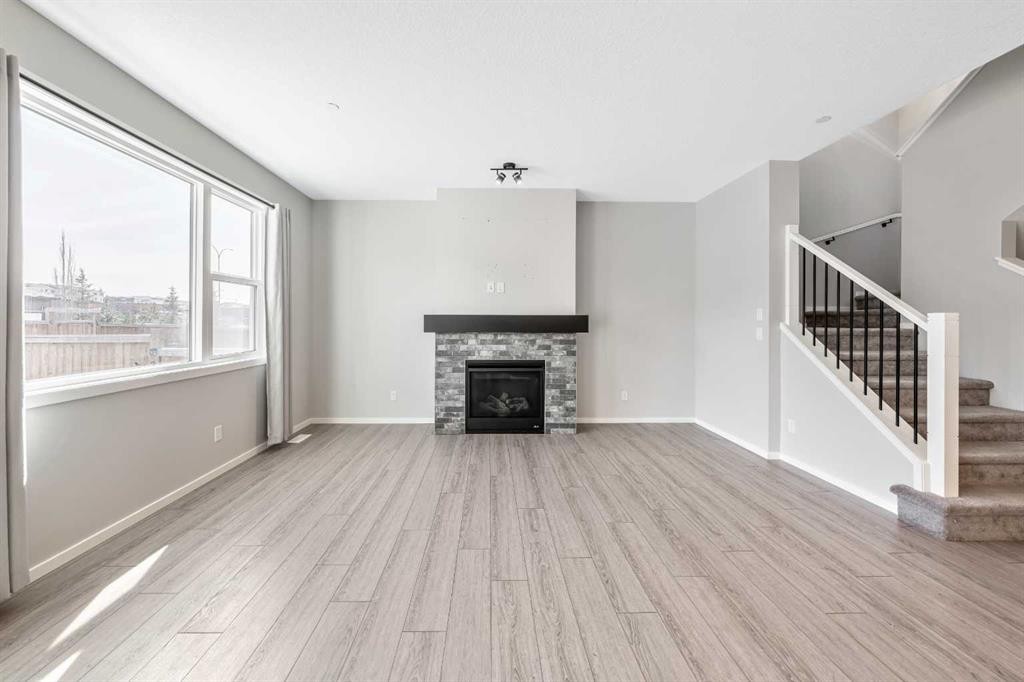98 Lucas Crescent Nw, Calgary, AB - Indoor Photo Showing Living Room With Fireplace