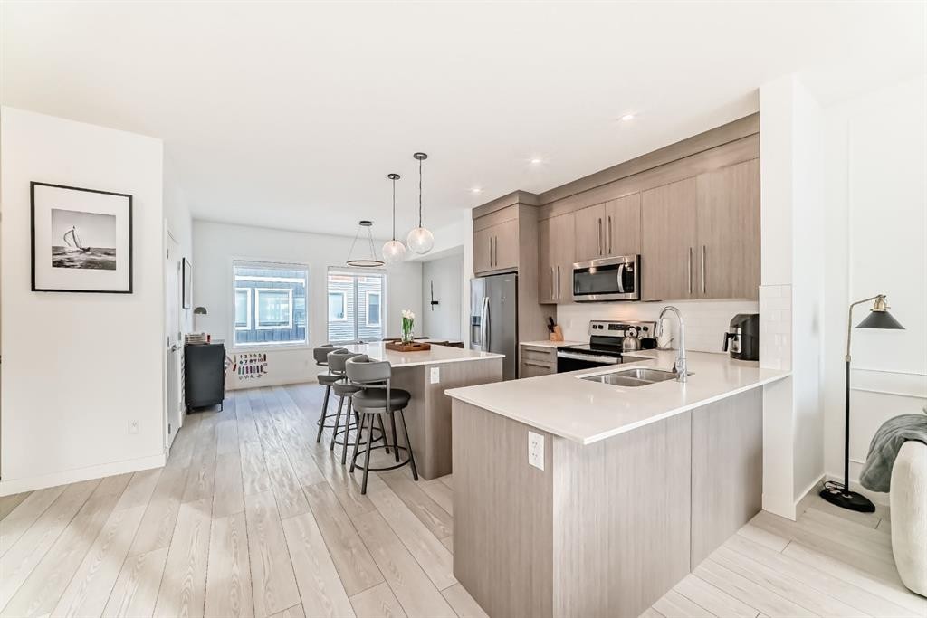 202 Creekstone Drive Sw, Calgary, AB - Indoor Photo Showing Kitchen With Double Sink