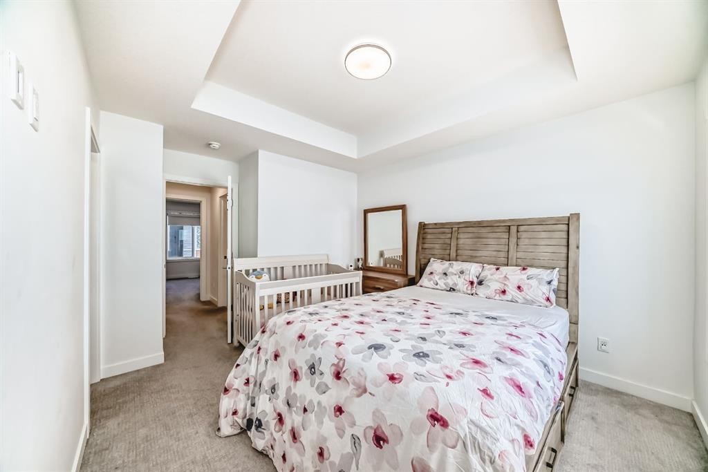 202 Creekstone Drive Sw, Calgary, AB - Indoor Photo Showing Bedroom