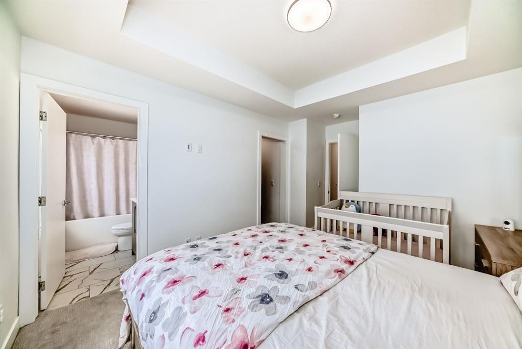 202 Creekstone Drive Sw, Calgary, AB - Indoor Photo Showing Bedroom