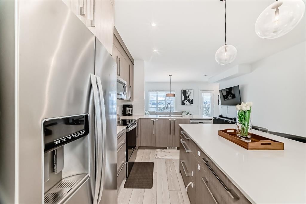 202 Creekstone Drive Sw, Calgary, AB - Indoor Photo Showing Kitchen With Upgraded Kitchen