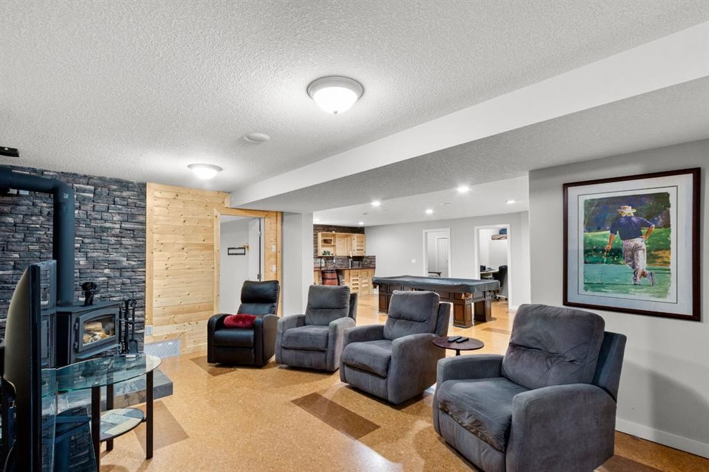 29 Sandpiper Drive, Didsbury, AB - Indoor Photo Showing Living Room With Fireplace