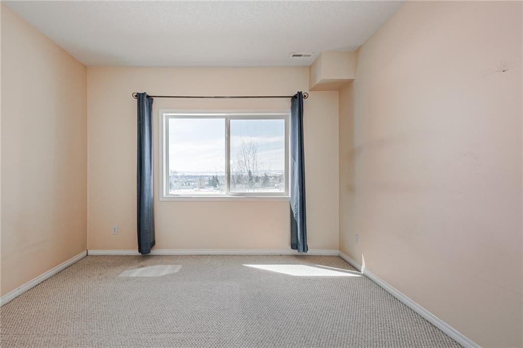 144 Rocky Vista Terrace Nw, Calgary, AB - Indoor Photo Showing Other Room