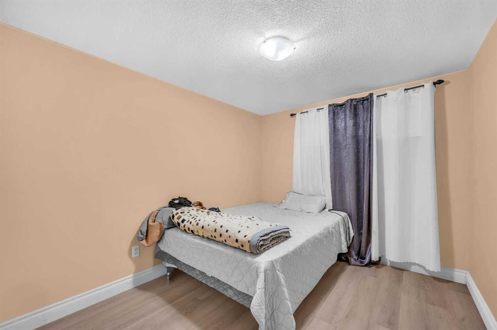 48 Faldale Close Ne, Calgary, AB - Indoor Photo Showing Bedroom