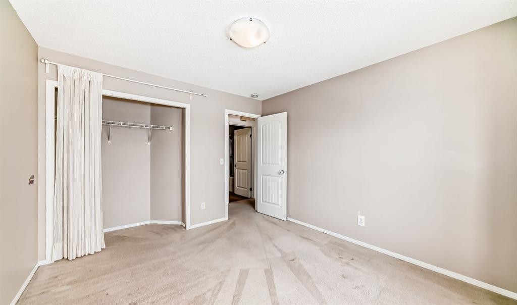 205-27 Everridge Square Sw, Calgary, AB - Indoor Photo Showing Other Room