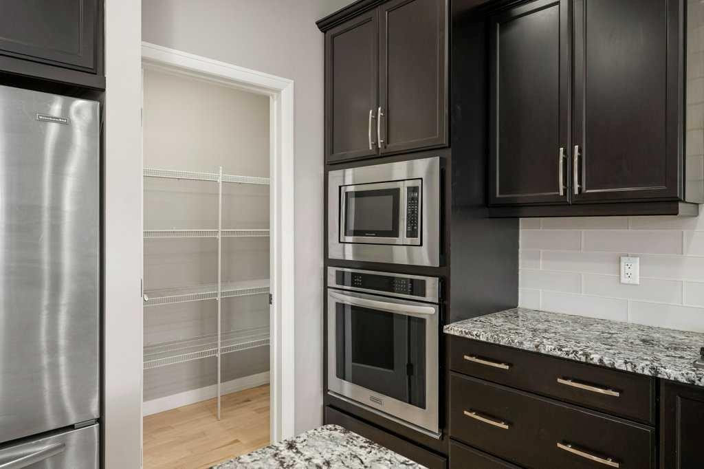 54 Auburn Crest Way Se, Calgary, AB - Indoor Photo Showing Kitchen With Upgraded Kitchen