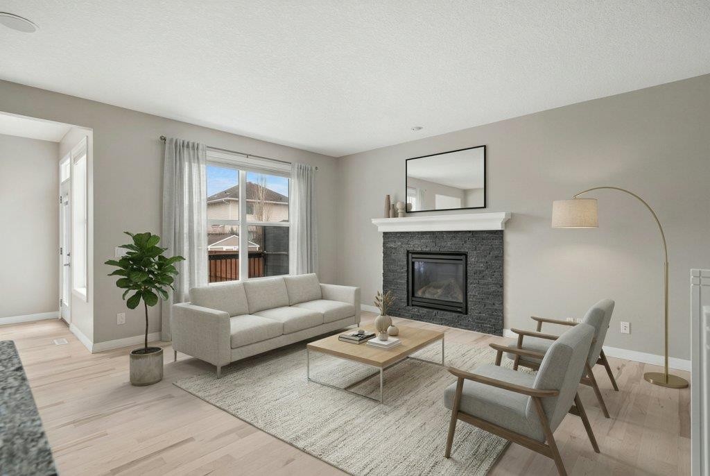 54 Auburn Crest Way Se, Calgary, AB - Indoor Photo Showing Living Room With Fireplace