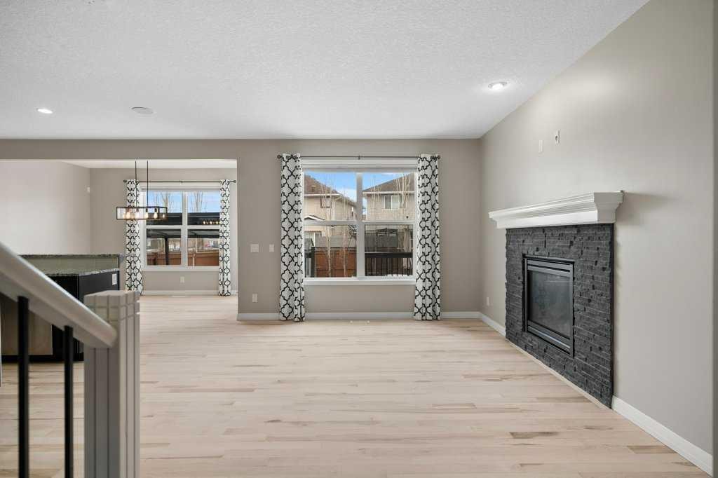 54 Auburn Crest Way Se, Calgary, AB - Indoor Photo Showing Other Room With Fireplace