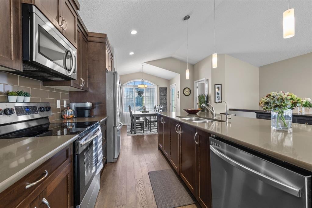 47 Cranford Crescent Se, Calgary, AB - Indoor Photo Showing Kitchen With Stainless Steel Kitchen With Double Sink With Upgraded Kitchen