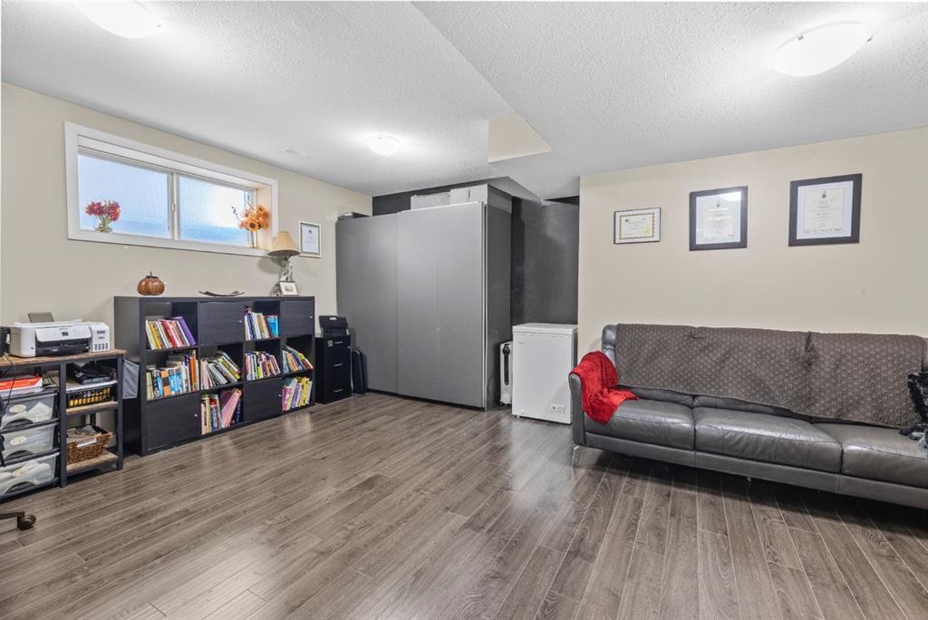 47 Cranford Crescent Se, Calgary, AB - Indoor Photo Showing Living Room