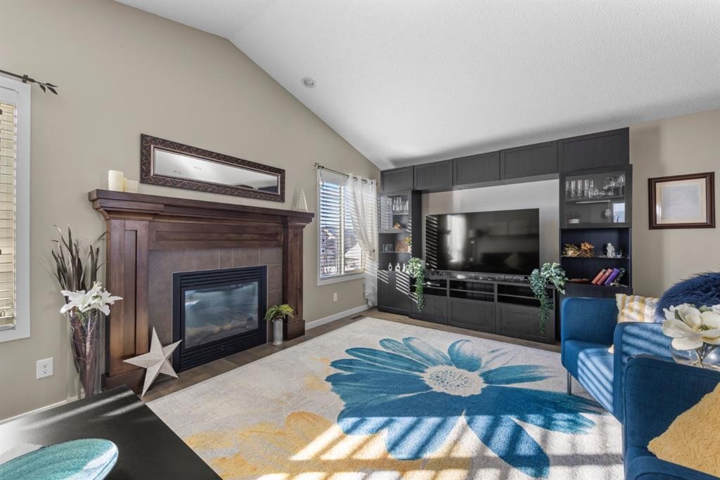 47 Cranford Crescent Se, Calgary, AB - Indoor Photo Showing Living Room With Fireplace