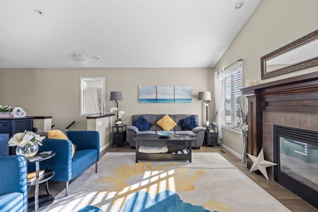 47 Cranford Crescent Se, Calgary, AB - Indoor Photo Showing Living Room With Fireplace