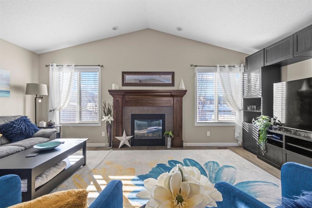 47 Cranford Crescent Se, Calgary, AB - Indoor Photo Showing Living Room With Fireplace