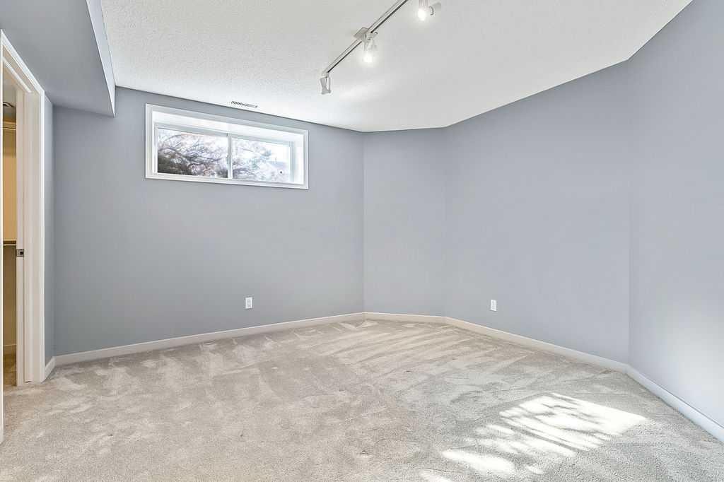 303 Schubert Place Nw, Calgary, AB - Indoor Photo Showing Other Room