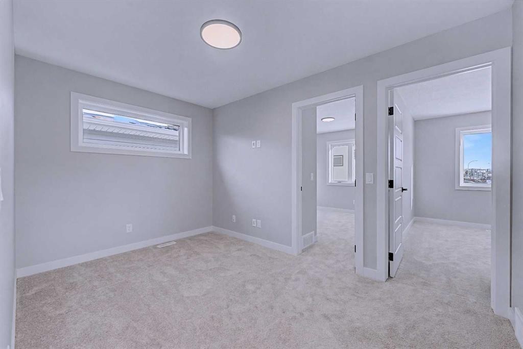41 Ambleton Boulevard Nw, Calgary, AB - Indoor Photo Showing Other Room