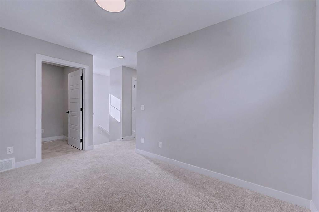 41 Ambleton Boulevard Nw, Calgary, AB - Indoor Photo Showing Other Room