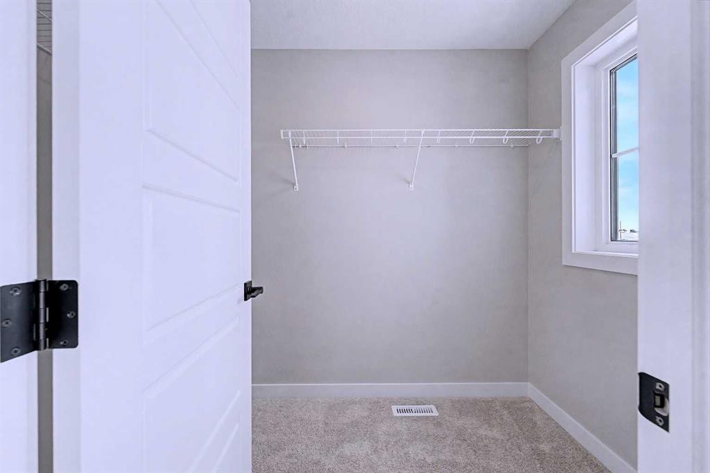 41 Ambleton Boulevard Nw, Calgary, AB - Indoor With Storage
