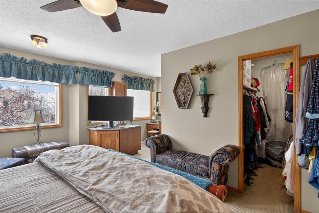 204 Sunrise Circle Se, Calgary, AB - Indoor Photo Showing Bedroom